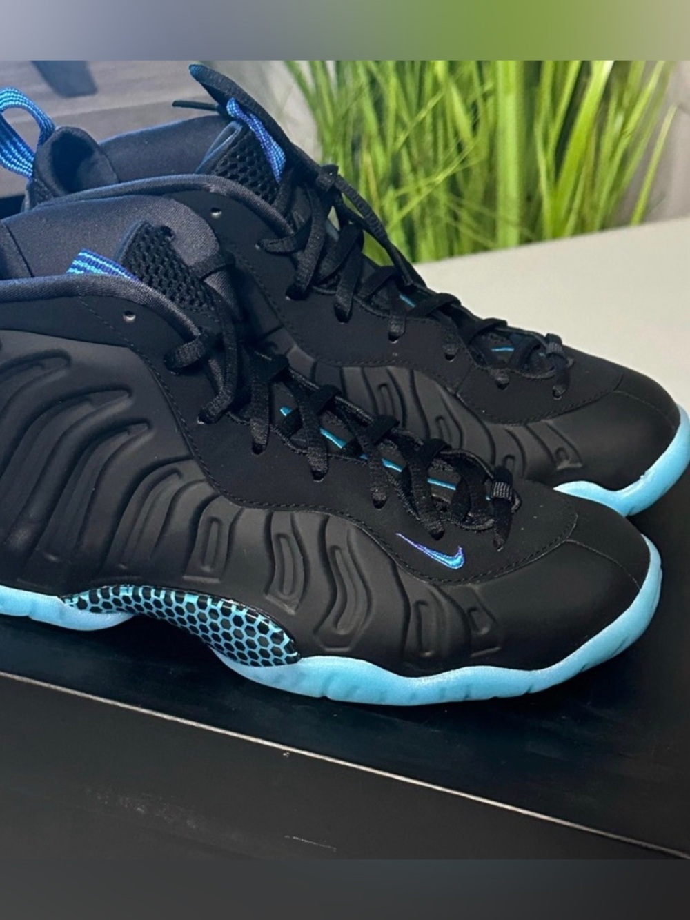 Nike Black Sneakers with Bright Blue Accents